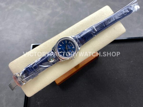 8+ Factory Counterweight Rolex Day-Date 36mm 128239-0069 White Gold Crocodile Leather Strap Baguette Diamond Blue Dial
