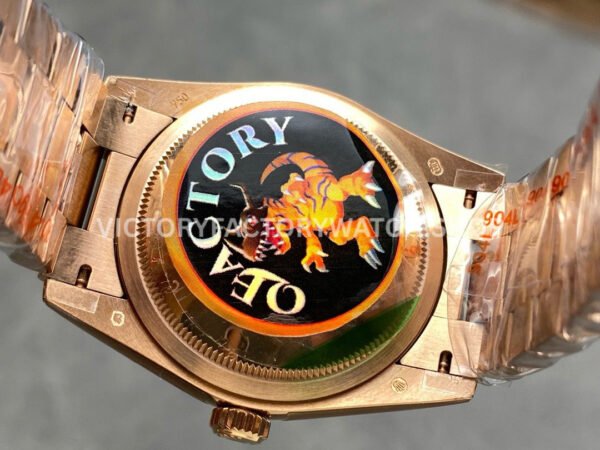 QF Factory Counterweight Rolex Day-Date 128235-0037 36mm Full Rose Gold Diamo (7) QF Factory Counterweight Rolex Day-Date 128235-0037 36mm Full Rose Gold Diamond Mope Baguette Diamond Brown Dial