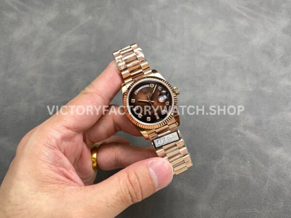 QF Factory Counterweight Rolex Day-Date 128235-0037 36mm Full Rose Gold Diamond (1) QF Factory Counterweight Rolex Day-Date 128235-0037 36mm Full Rose Gold Diamond Mope Baguette Diamond Brown Dial