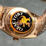 QF Factory Counterweight Rolex Day-Date 128235-0052 36mm Full Rose Gold Roman Numerals White (5) QF Factory Counterweight Rolex Day-Date 128235-0052 36mm Full Rose Gold Roman Numerals White Dial