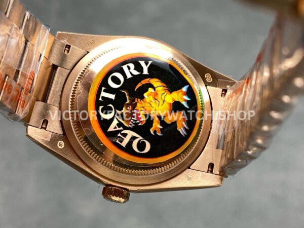 QF Factory Counterweight Rolex Day-Date 128235-0052 36mm Full Rose Gold Roman Numerals White (5) QF Factory Counterweight Rolex Day-Date 128235-0052 36mm Full Rose Gold Roman Numerals White Dial