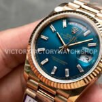 QF Factory Counterweight Rolex Day-Date 128235-0085 36mm Full Rose Gold Baguette Diam (3) QF Factory Counterweight Rolex Day-Date 128235-0085 36mm Full Rose Gold Baguette Diamonds Dark Blue Dial