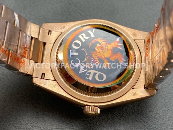 QF Factory Counterweight Rolex Day-Date 128235-0085 36mm Full Rose Gold Baguette Diam (5) QF Factory Counterweight Rolex Day-Date 128235-0085 36mm Full Rose Gold Baguette Diamonds Dark Blue Dial