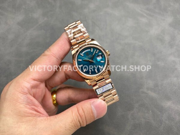 QF Factory Counterweight Rolex Day-Date 128235-0085 36mm Full Rose Gold Baguette Diam (7) QF Factory Counterweight Rolex Day-Date 128235-0085 36mm Full Rose Gold Baguette Diamonds Dark Blue Dial