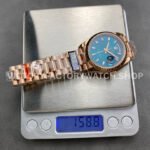 QF Factory Counterweight Rolex Day-Date 128235-0085 36mm Full Rose Gold Baguette Diam (9) QF Factory Counterweight Rolex Day-Date 128235-0085 36mm Full Rose Gold Baguette Diamonds Dark Blue Dial