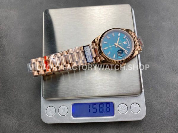 QF Factory Counterweight Rolex Day-Date 128235-0085 36mm Full Rose Gold Baguette Diam (9) QF Factory Counterweight Rolex Day-Date 128235-0085 36mm Full Rose Gold Baguette Diamonds Dark Blue Dial