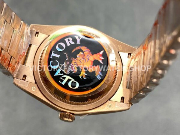 QF Factory Counterweight Rolex Day-Date 128235-0087 36mm Full Rose Gold Baguette Diamond (9) QF Factory Counterweight Rolex Day-Date 128235-0087 36mm Full Rose Gold Baguette Diamond Silver Dial