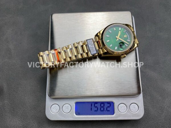 QF Factory Counterweight Rolex Day-Date 128238-0130 36mm Full Yellow Gold Baguette Diamo (5) QF Factory Counterweight Rolex Day-Date 128238-0130 36mm Full Yellow Gold Baguette Diamond Green Dial