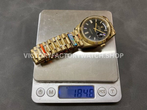 QF Factory Counterweight Rolex Day-Date 228238-0004 40mm Full Yellow Gold Baguette Diamond Bla (5) QF Factory Counterweight Rolex Day-Date 228238-0004 40mm Full Yellow Gold Baguette Diamond Black Dial