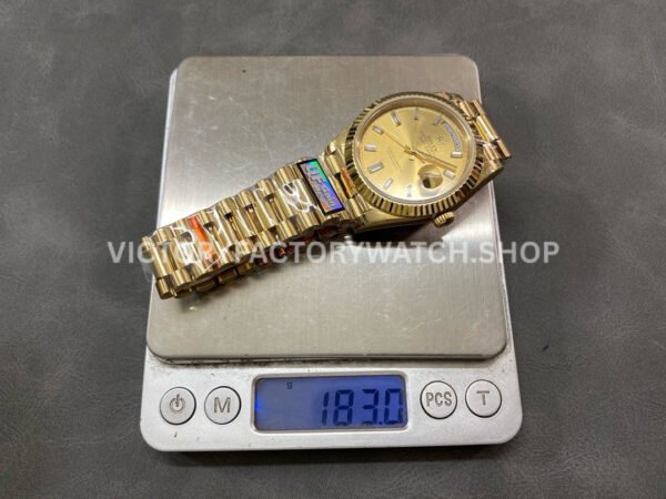 QF Factory Counterweight Rolex Day-Date 228238-0005 40mm Full Yellow Gold Baguette Diamon (6) QF Factory Counterweight Rolex Day-Date 228238-0005 40mm Full Yellow Gold Baguette Diamond Champagne Dial