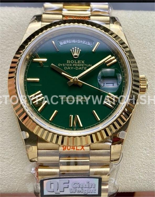 QF Factory Day-Date 228238 replica with green dial and Roman numerals in yellow gold case.