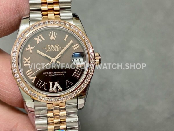 Sophisticated Datejust 278381RBR replica with diamond bezel, brown dial and two tone rose gold styling.
