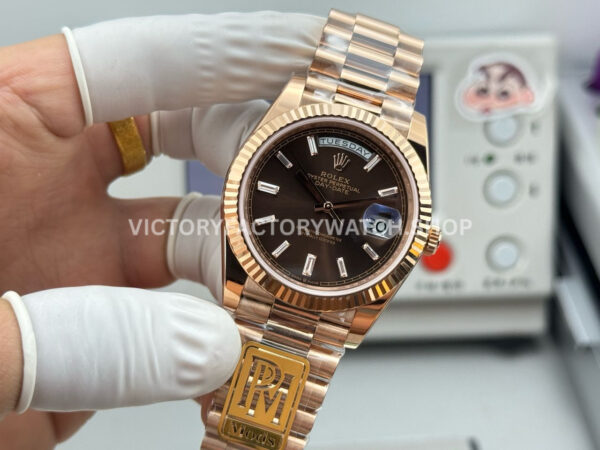 PPM Factory Counterweight Rolex Day-Date 228235-0003 40mm Full Rose Gold Baguette Diamond Brown Dial (1) PPM Factory Counterweight Rolex Day-Date 228235-0003 40mm Full Rose Gold Baguette Diamond Brown Dial