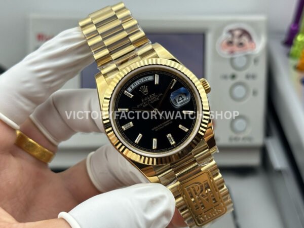 PPM Factory Counterweight Rolex Day-Date 228238-0004 40mm Full Yellow Gold Diamond Baguette Black Dial (2) PPM Factory Counterweight Rolex Day-Date 228238-0004 40mm Full Yellow Gold Diamond Baguette Black Dial