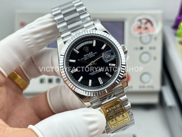 PPM Factory Counterweight Rolex Day-Date 228239-0005 40mm Full White Gold Baguette Diamond Black Dial (1) PPM Factory Counterweight Rolex Day-Date 228239-0005 40mm Full White Gold Baguette Diamond Black Dial