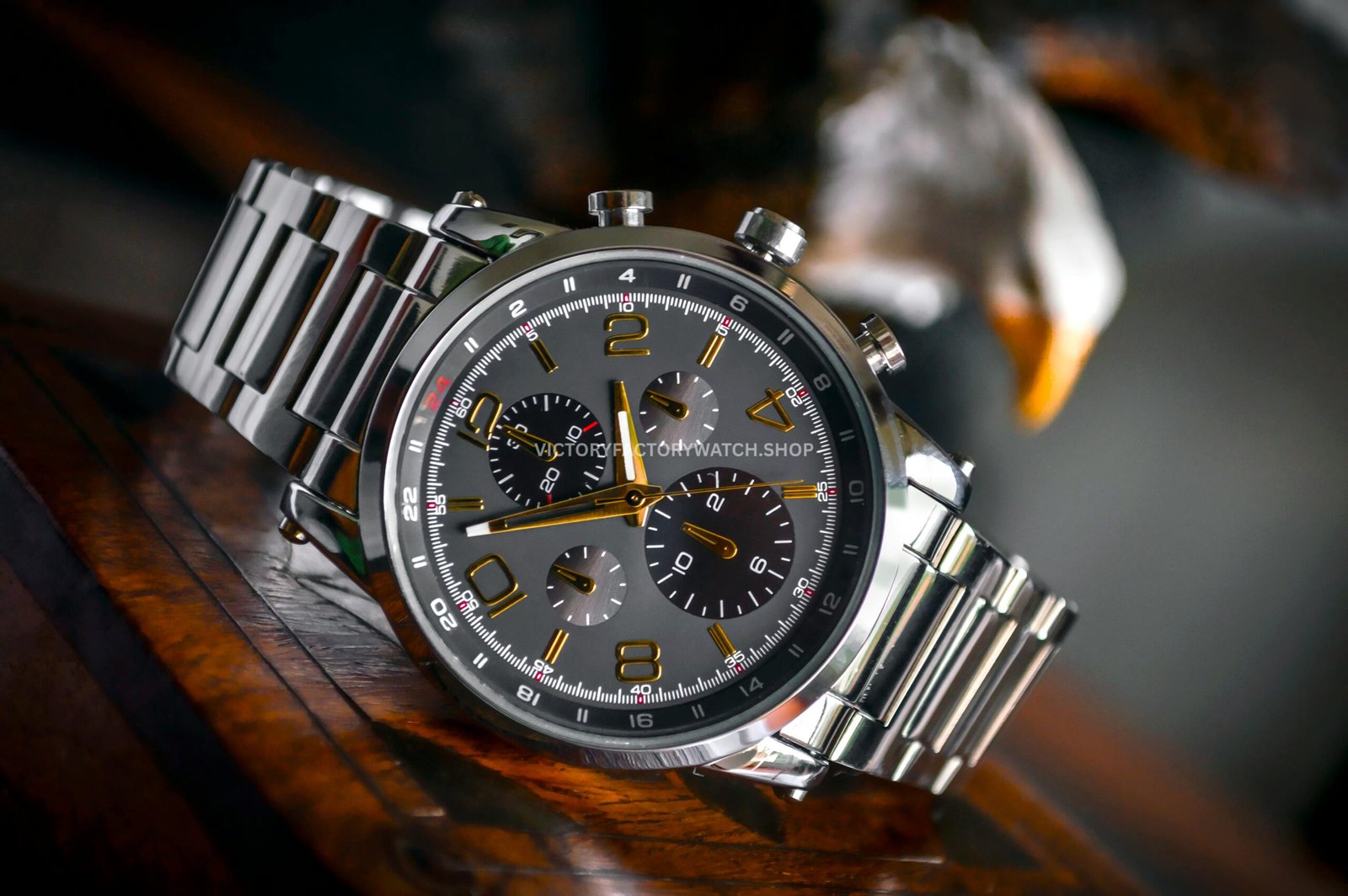 Close-up of a luxury replica chronograph watch with stainless steel strap and detailed dial, highlighting precision design