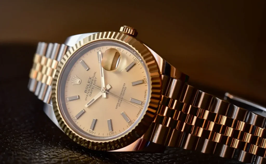 Two-tone Rolex Datejust with gold and steel jubilee bracelet showcasing premium luxury watch finishing details