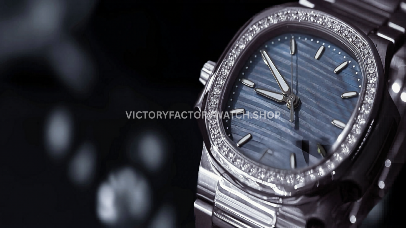 Macro shot of a Nautilus-style blue dial watch showing horizontal groove texture, applied indices, and polished bezel details — key features that define high-quality Nautilus replicas.