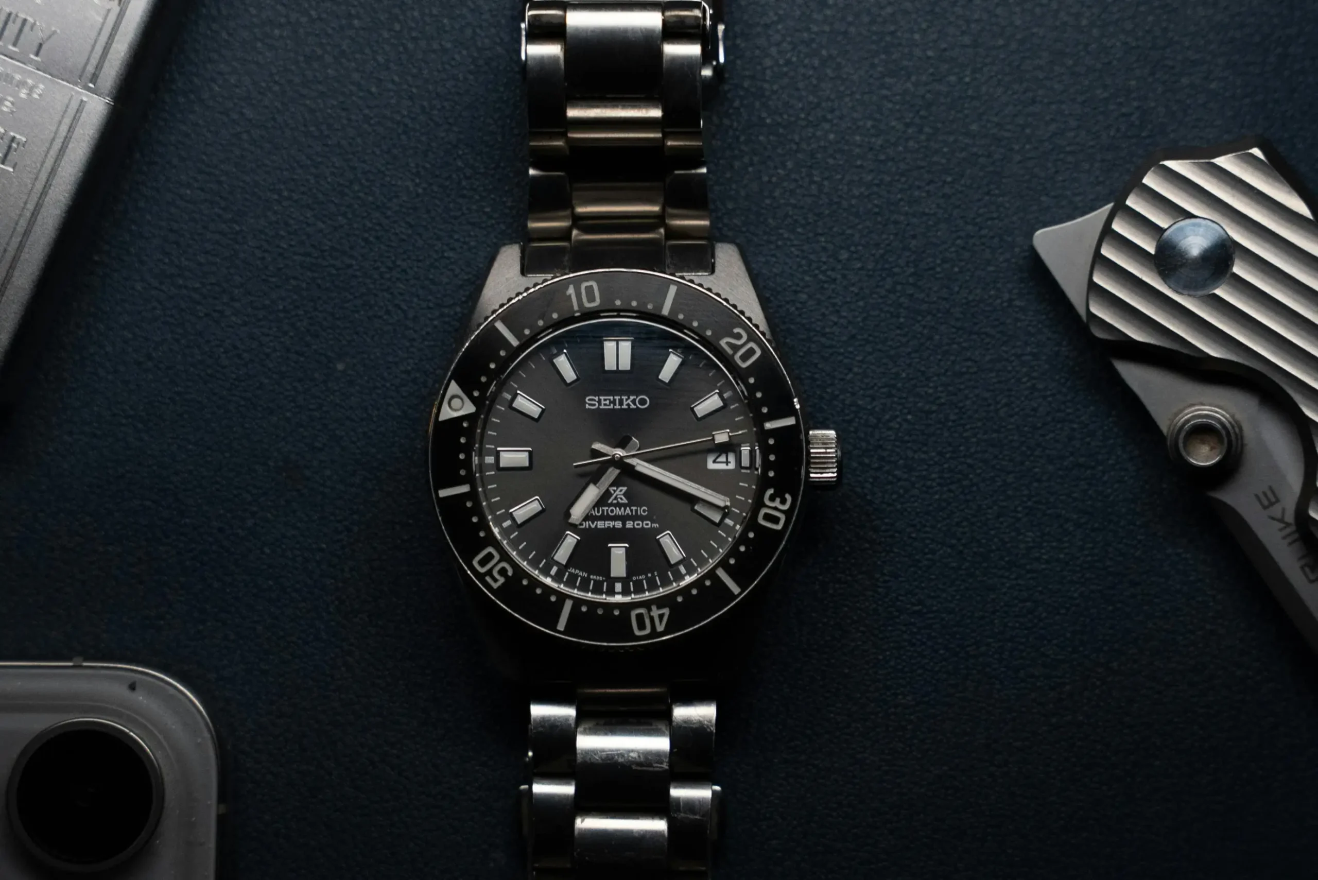 A minimalist diver-style watch layout often compared with rolex submariner replica designs, reflecting the clean and functional aesthetic achieved by VSF and victory factory rolex models.