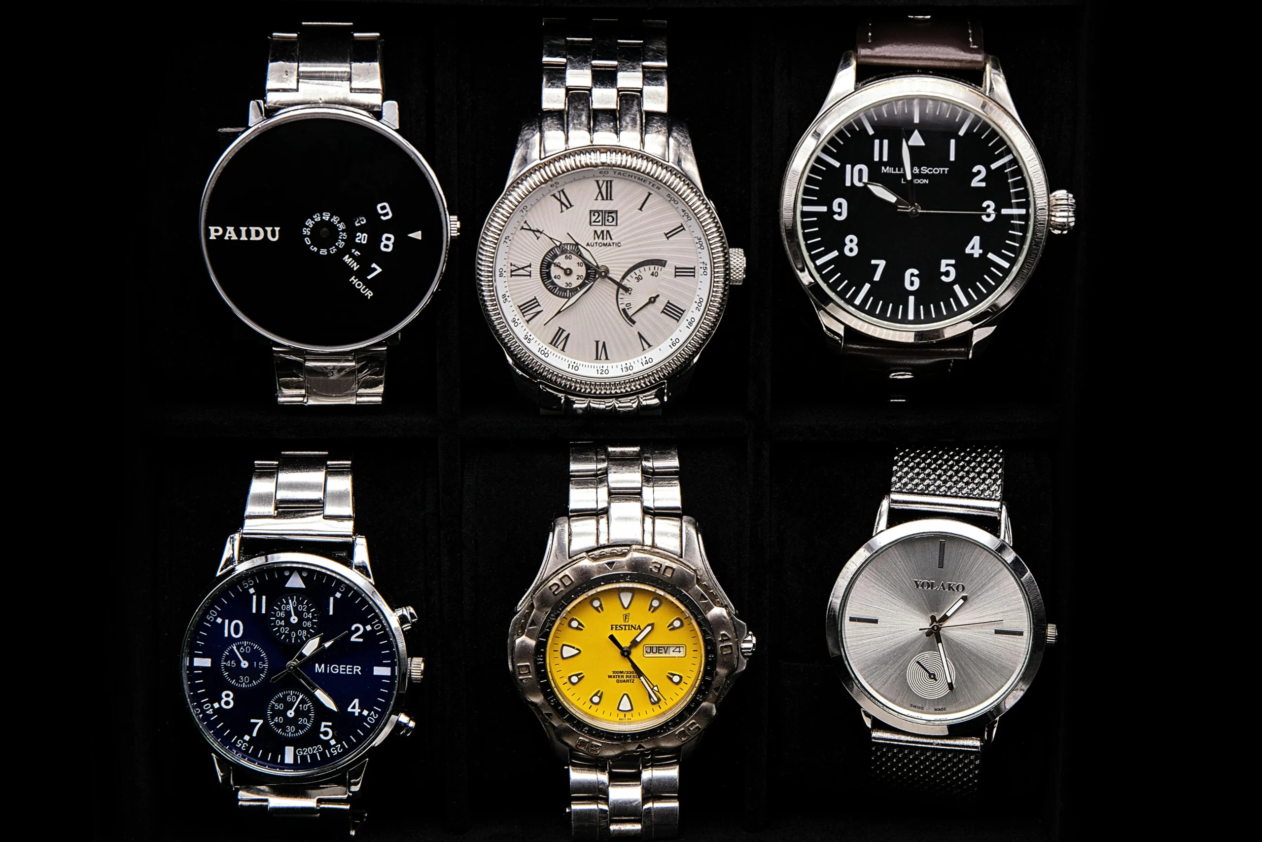 A collection of various timepieces arranged in a travel case, representing rolex datejust replica and other VSF replica watches designed for collectors seeking variety and portability.