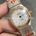 TW Factory Omega Constellation Quartz 123.20.27.60.55.001 27mm Half Ros (1) TW Factory Omega Constellation Quartz 123.20.27.60.55.001 27mm Half Rose Gold Rose Diamond Mother Of Pearl Dial