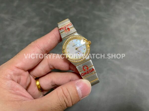 TW Factory Omega Constellation Quartz 123.20.27.60.55.002 27mm Half Yellow Gold Diamon ( (5) TW Factory Omega Constellation Quartz 123.20.27.60.55.002 27mm Half Yellow Gold Diamond Gold Bezel Mother Of Pearl Diamond Dial