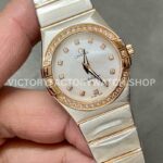 TW Factory Omega Constellation Quartz 123.25.27.60.55.007 27mm Half Rose Gold ( (7) TW Factory Omega Constellation Quartz 123.25.27.60.55.007 27mm Half Rose Gold Diamond Rose Gold Bezel Mother Of Pearl Diamond Dial