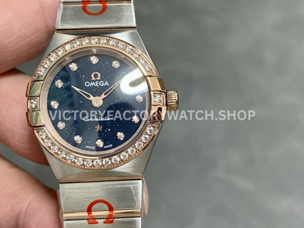 TW Factory Omega Constellation Quartz 131.25.25.60.53.002 27mm half rose gold Roman number rose gold bezel diamond gypsophila blue dial replica watch