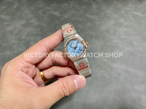 TW Factory Omega Constellation Quartz 131.25.28.60.99.001 27mm Diamond Bezel Half Rose Gold S (4) TW Factory Omega Constellation Quartz 131.25.28.60.99.001 27mm Half Rose Gold Diamond Bezel Diamond Blue Dial