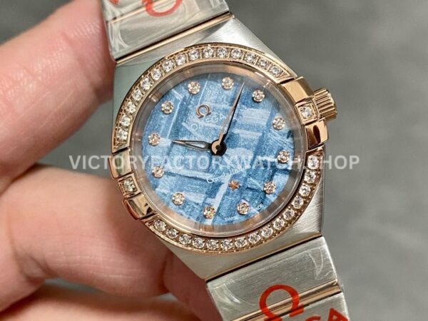 TW Factory Omega Constellation Quartz 131.25.28.60.99.001 27mm Diamond Bezel Half Rose Gold S (9) TW Factory Omega Constellation Quartz 131.25.28.60.99.001 27mm Half Rose Gold Diamond Bezel Diamond Blue Dial