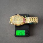 CBD Factory Counterweight Rolex Day-Date 228238-0005 40mm Full Yellow Gold Champagne Baguette Dial