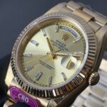 CBD Factory Counterweight Rolex Day-Date 228238-0005 40mm Full Yellow Gold Champagne Baguette Dial