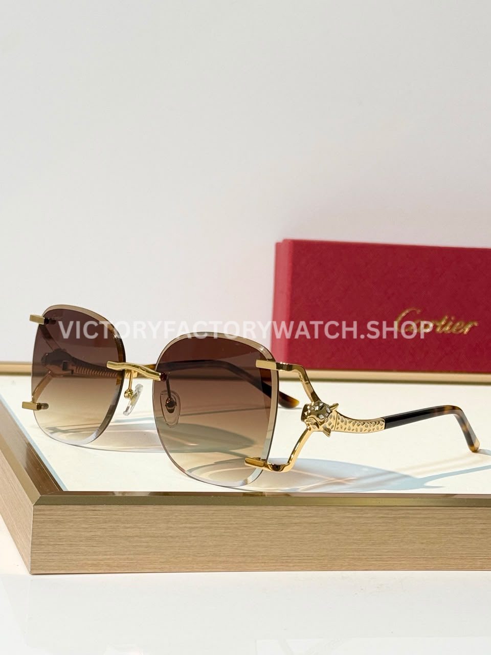 Cartier CT02283O Rimless Sunglasses Gold-Tone Panther Temples & Brown Gradient Lenses (1)