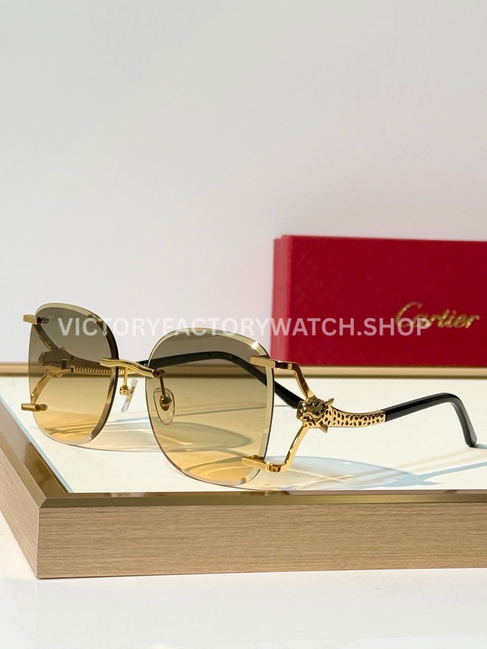 Cartier CT02283O Rimless Sunglasses Gold-Tone Panther Temples & Grey-Green to Yellow Gradient Lenses (1)