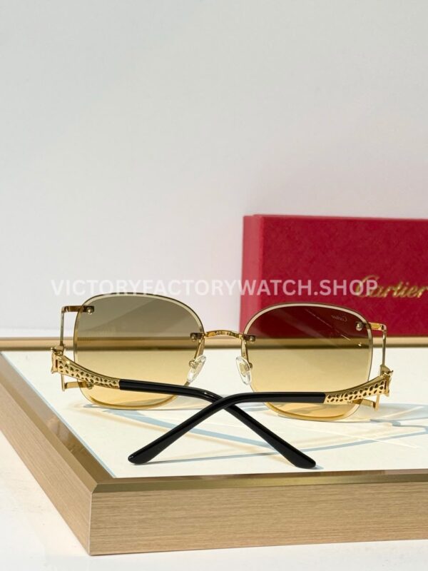 Cartier CT02283O Rimless Sunglasses Gold-Tone Panther Temples & Grey-Green to Yellow Gradient Lenses (3) Cartier CT02283O Rimless Sunglasses | Gold-Tone Panther Temples & Grey-Green to Yellow Gradient Lenses