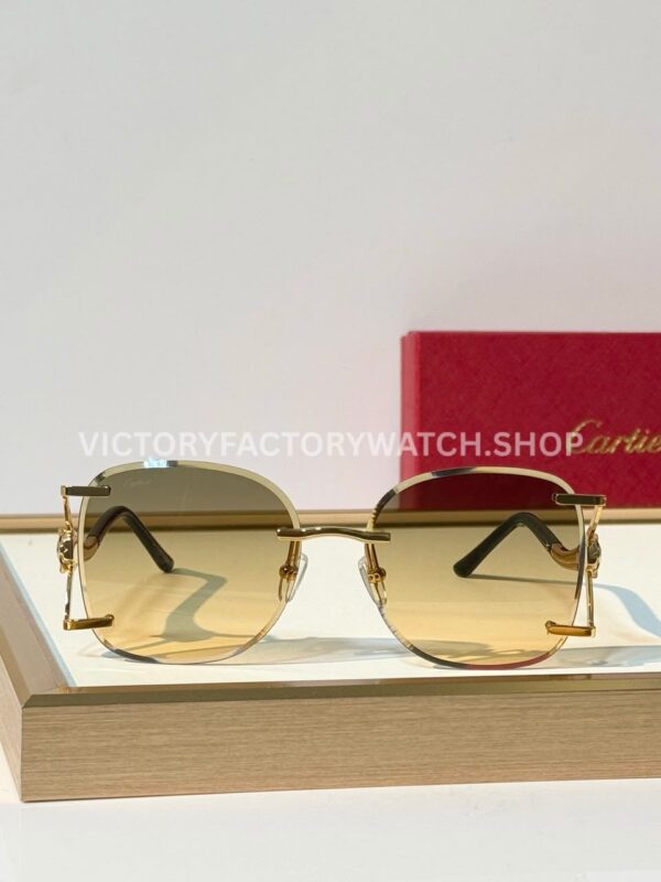 Cartier CT02283O Rimless Sunglasses Gold-Tone Panther Temples & Grey-Green to Yellow Gradient Lenses (5) Cartier CT02283O Rimless Sunglasses | Gold-Tone Panther Temples & Grey-Green to Yellow Gradient Lenses
