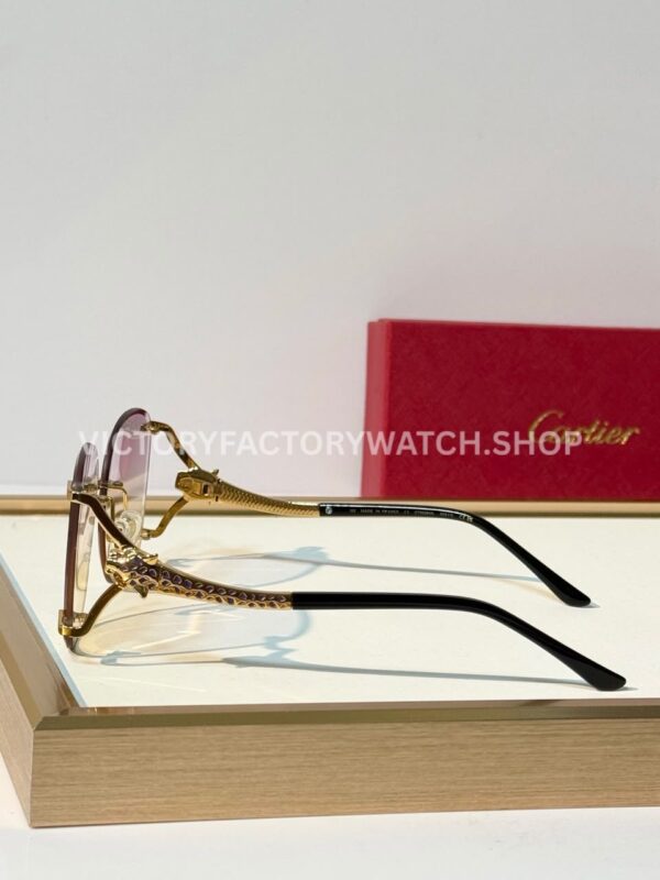 Cartier CT02283O Rimless Sunglasses Gold-Tone Panther Temples & Purple–Yellow Gradient Lenses (1) Cartier CT02283O Rimless Sunglasses | Gold-Tone Panther Temples & Purple–Yellow Gradient Lenses