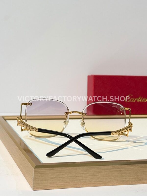 Cartier CT02283O Rimless Sunglasses Gold-Tone Panther Temples & Purple–Yellow Gradient Lenses (10) Cartier CT02283O Rimless Sunglasses | Gold-Tone Panther Temples & Purple–Yellow Gradient Lenses