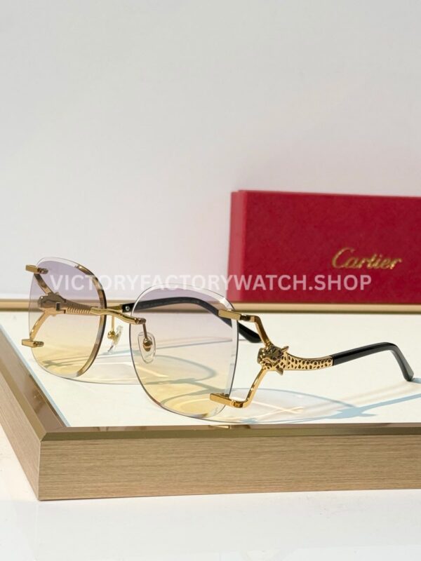 Cartier CT02283O Rimless Sunglasses Gold-Tone Panther Temples & Purple–Yellow Gradient Lenses (2) Cartier CT02283O Rimless Sunglasses | Gold-Tone Panther Temples & Purple–Yellow Gradient Lenses