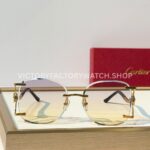 Cartier CT02283O Rimless Sunglasses Gold-Tone Panther Temples & Purple–Yellow Gradient Lenses (3) Cartier CT02283O Rimless Sunglasses | Gold-Tone Panther Temples & Purple–Yellow Gradient Lenses