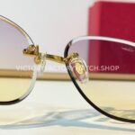Cartier CT02283O Rimless Sunglasses Gold-Tone Panther Temples & Purple–Yellow Gradient Lenses (6) Cartier CT02283O Rimless Sunglasses | Gold-Tone Panther Temples & Purple–Yellow Gradient Lenses