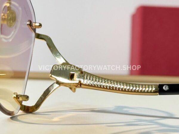 Cartier CT02283O Rimless Sunglasses Gold-Tone Panther Temples & Purple–Yellow Gradient Lenses (7) Cartier CT02283O Rimless Sunglasses | Gold-Tone Panther Temples & Purple–Yellow Gradient Lenses