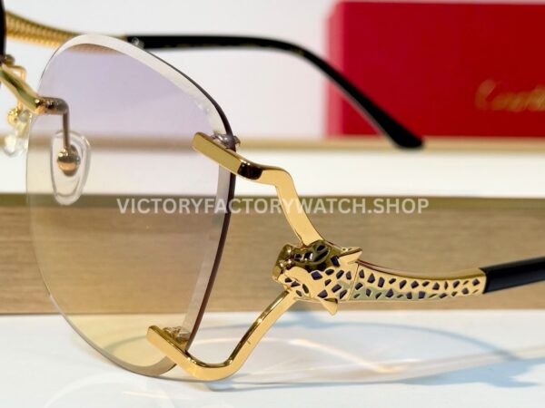 Cartier CT02283O Rimless Sunglasses Gold-Tone Panther Temples & Purple–Yellow Gradient Lenses (8) Cartier CT02283O Rimless Sunglasses | Gold-Tone Panther Temples & Purple–Yellow Gradient Lenses