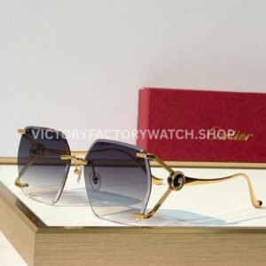 Cartier CT7194S Rimless Sunglasses | Gold-Tone Temples, Black Circular Accents & Grey Gradient Lenses
