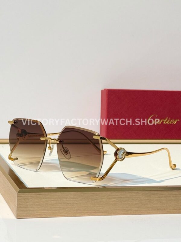 Cartier CT7194S Rimless Sunglasses Gold-Tone Temples, Milky White Circular Accents & Brown Gradient Lenses (1) Cartier CT7194S Rimless Sunglasses | Gold-Tone Temples, Milky White Circular Accents & Brown Gradient Lenses