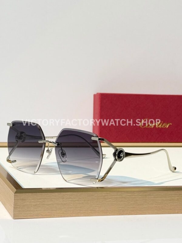 Cartier CT7194S Rimless Sunglasses Silver-Tone Temples, Black Circular Accents & Grey Gradient Lenses (1) Cartier CT7194S Rimless Sunglasses | Silver-Tone Temples, Black Circular Accents & Grey Gradient Lenses
