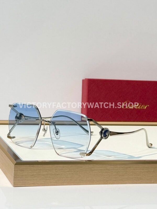 Cartier CT7194S Rimless Sunglasses Silver-Tone Temples, Blue Circular Accents & Blue Gradient Lenses (2) Cartier CT7194S Rimless Sunglasses | Silver-Tone Temples, Blue Circular Accents & Blue Gradient Lenses