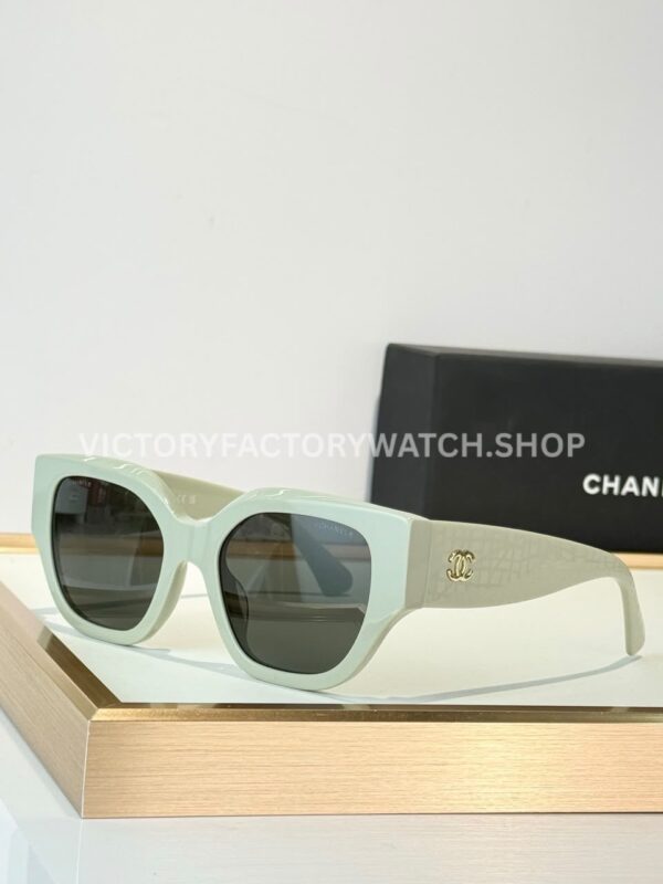 Chanel 5571 Cat-Eye Sunglasses Ivory Frame & Dark Grey-Green Lenses (1) Chanel 5571 Cat-Eye Sunglasses | Ivory Frame & Dark Grey-Green Lenses